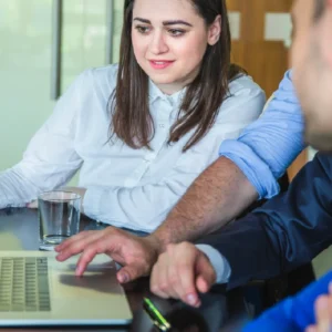 Colleagues working on laptop